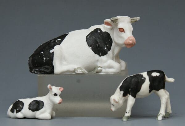 Britains Cow Lying and Herald Calves - Later Friesian Markings